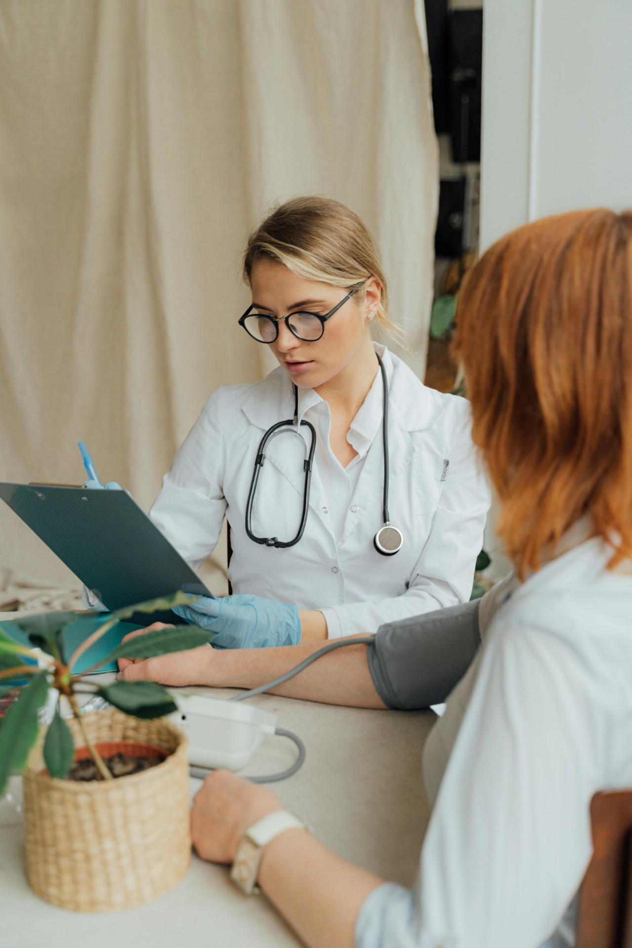 Nurse consulting with patient